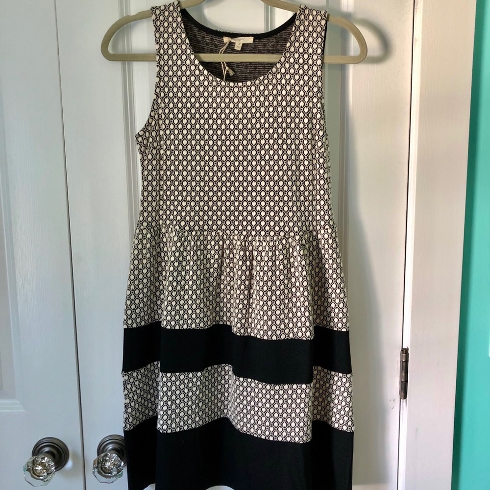 Cream and black dress